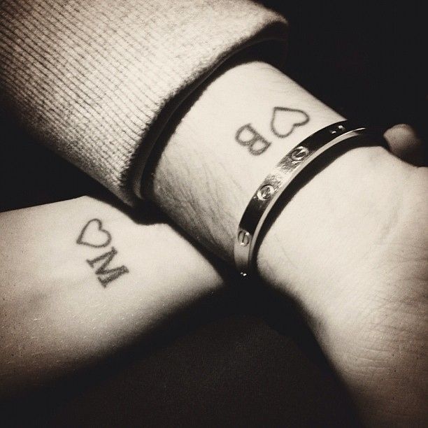 Word and letters Couple tattoos