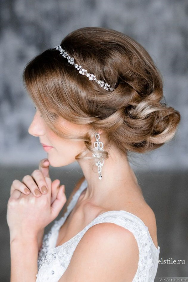 elegant-updo-wedding-hairstyles-with-crystal-bridal-headpieces